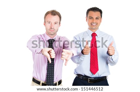A close-up portrait of two businessman, friends; one being excited, smiling, showing thumbs-up, the other serious, concerned, showing thumbs down; isolated on a white background. Emotion contrasts