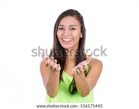 A portrait of a smiling happy teenager excited girl with raised up palms arms at you isolated over white background concept of freedom and happy student young pretty woman asking us to give a hug A portrait of a smiling happy teenager excited girl with raised up palms arms at you isolated over white background concept of freedom and happy student young pretty woman asking us to give a hug