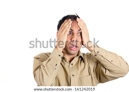 Closeup portrait of shocked, horrified, handsome worried and stressed guy with hands on face looking away from camera gesture, isolated on white background. Negative human emotion facial expressions