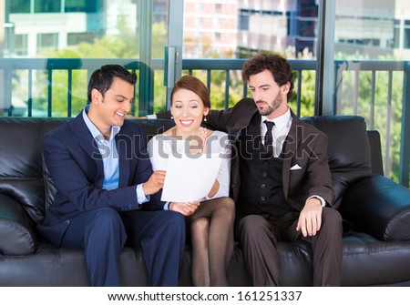 Picture of a manager, financial consultant, banker presenting to a young smiling couple a business investment opportunity plan, isolated on a background of city buildings. Finance smart decisions.