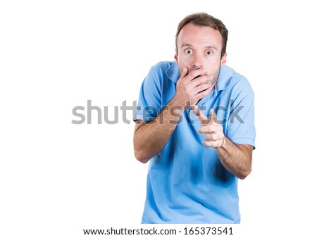 Closeup portrait of a handsome young man looking shocked, surprised in full disbelief pointing at you camera gesture, isolated on white background. Negative human emotions facial expressions