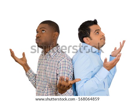 Closeup portrait of two men back to back putting hands in air looking up in frustration, isolated on white background. Negative human emotion facial expression feelings. Miscommunication conflict