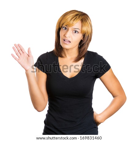 Closeup portrait of young annoyed woman with bad attitude giving talk to the hand gesture with palm outward, isolated on white background. Negative emotion facial expression feelings.