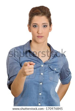 Closeup portrait of young unhappy, serious woman pointing at someone as if to say you did something wrong, bad boy, isolated on white background. Negative human emotions, facial expressions, feelings