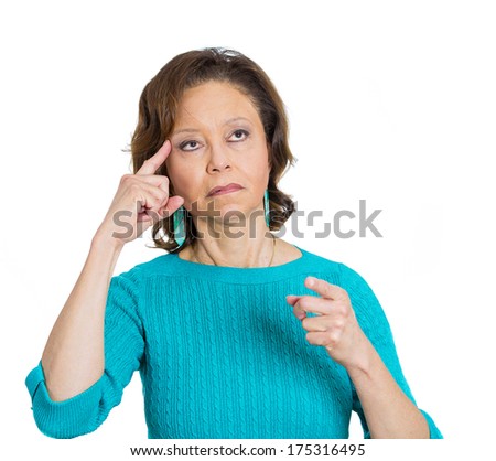 Closeup portrait of senior mature woman suffering from memory loss, trying to recall information, isolated on white background. Negative emotion facial expression feelings. Geriatric health issues