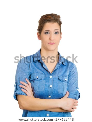 Closeup portrait of skeptical grumpy young woman looking suspicious with disgust on her face mixed with disapproval, isolated on white background. Negative human emotions, facial expressions, feelings