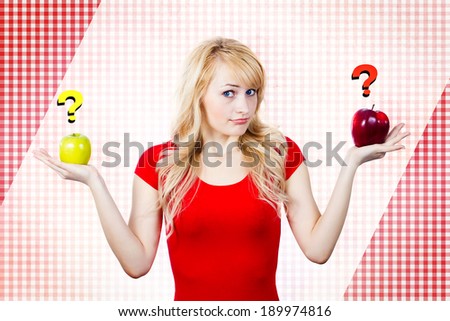 Closeup portrait confused, puzzled, unhappy, thoughtful young woman, girl, holding red, green apples, uncertain which one to chose. Human face expressions, emotion, reaction, attitude, life perception