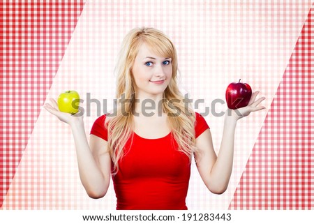 Closeup portrait puzzled, thinking, thoughtful young woman, girl, holding red, green apples, uncertain which one to chose. Human face expressions, emotion, reaction, attitude, life perception, variety