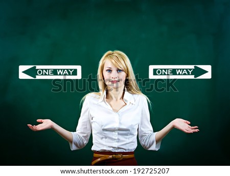 Closeup portrait confused young woman asking with hands, not sure which way, where go in life, isolated green background, with direction signs. Emotion, facial expression, feeling, reaction perception