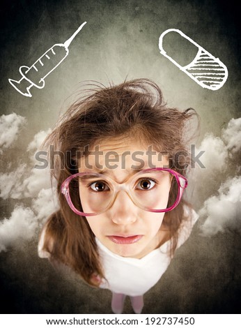 Closeup portrait, headshot little sad girl with glasses, scared, afraid, about to cry, isolated background with syringe, blood sample tube. Negative human emotion, facial expression, reaction, feeling