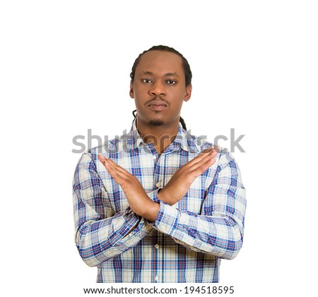 Closeup portrait angry young man with X gesture asking stop talking, cut it out, don\'t go there, isolated white background.