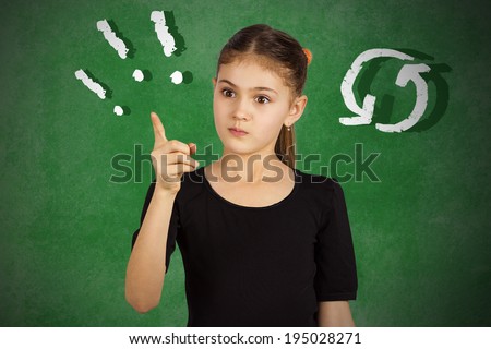 Closeup portrait serious, frowning, angry, grumpy little girl pointing finger upwards, scolding someone playing mature woman, isolated green background. Human face expressions, emotions, reaction