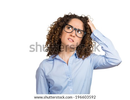 Closeup portrait young woman with glasses scratching head, thinking daydreaming deeply about something, looking up, isolated white background. Human facial expression emotions, feelings, body language