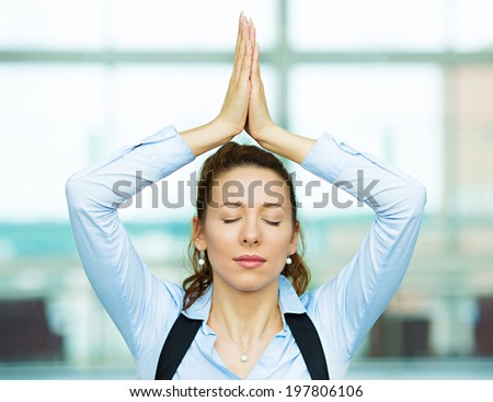 Closeup portrait beautiful hispanic businesswoman relaxing meditating eyes closed, indoors corporate building, office by doing some yoga isolated background windows. Positive emotion facial expression