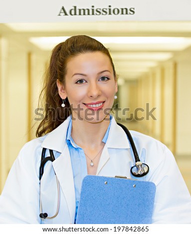 Closeup portrait, happy smiling health care professional, female doctor with stethoscope, isolated background hospital hallway. Patient admission, visit, plan, treatment. Positive facial expressions