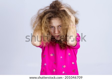 Closeup portrait angry, sad upset, grumpy, stressed little young girl, having nervous breakdown isolated black background. Negative human emotion facial expression feeling attitude reaction perception