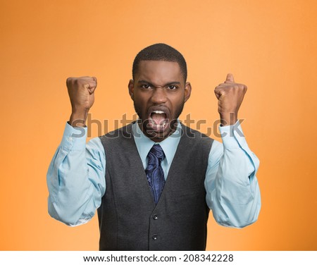 Closeup portrait bitter mad, displeased pissed off, angry grumpy corporate man, open mouth, hands in air, screaming yelling isolated orange background. Negative human emotion facial expression feeling
