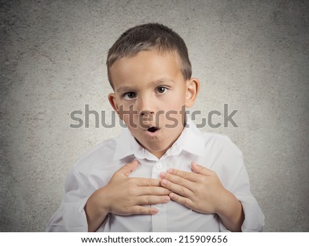 Wow, surprise. Portrait surprised child, boy with stunned face expression, disbelief, blown away by what he see, can\'t belief it is for real, isolated grey wall background. Human emotions, reaction