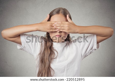 Portrait young teenager girl closing covering eyes with hands can\'t see hiding isolated grey background. See no evil concept turning wrongful in good. Human emotion facial expression feeling reaction