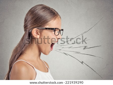 Side view profile portrait angry woman screaming wide open mouth hysterical isolated grey wall background. Negative human face expression emotion, bad feeling reaction. Conflict, confrontation concept