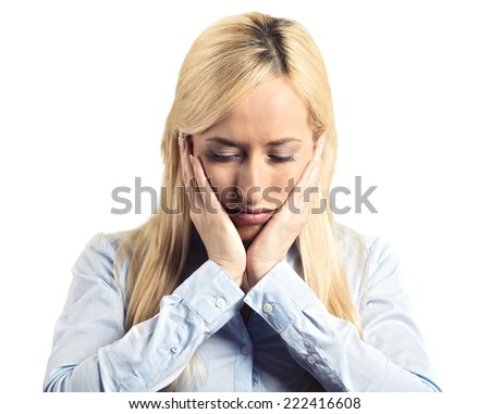 Closeup portrait headshot unhappy sad young business woman hands on head bothered by past mistakes in life isolated on white background. Negative human emotion, facial expression feeling reaction