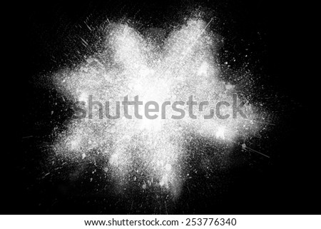 Freeze motion of white powder exploding, isolated on black, dark background. Abstract design of white dust cloud. Particles explosion screen saver, wallpaper brush. Planet creation concept