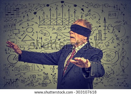 Portrait blindfolded elderly senior business man going through social media data