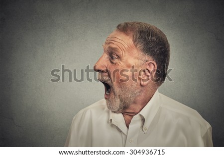 Surprised man with wide open mouth