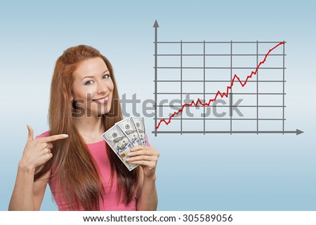 Business, people and money concept. Happy smiling businesswoman with dollar cash money on blue background and forex graph going up