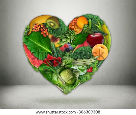 Healthy diet choice and heart health concept. Green vegetables and fruits shaped as heart  Heart disease prevention and food. Medical health care and nutrition dieting