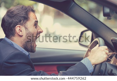 Side profile angry driver. Negative human emotions face expression
