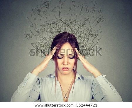 Closeup sad young woman with worried stressed face expression and brain melting into lines question marks. Obsessive compulsive anxiety disorders