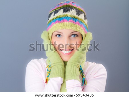 Surprised  happy adorable woman in winter clothes