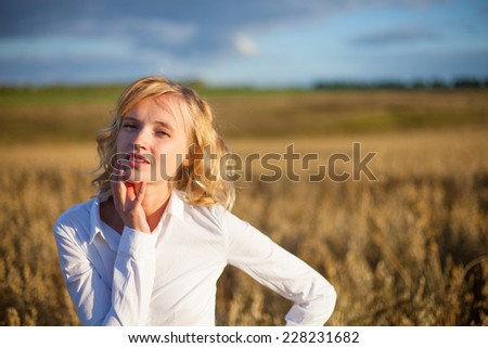 Serene Young Woman Enjoying A Walk In Nature