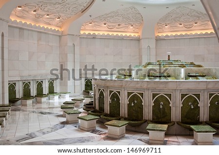 ABU DHABI - JUNE 5: A place for washing the feet in Mosque on June 5, 2013 in Abu Dhabi. The mosque is named after Sheikh Zayed bin Sultan Al Nahyan - the founder and first president of the UAE.