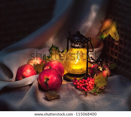 Autumn still life with apples and lamp, light painting