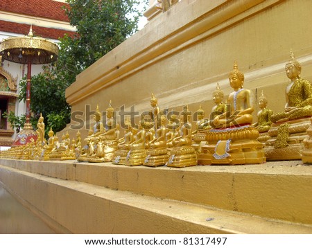 Collection of small Buddhist statues at Thai Buddhist temple