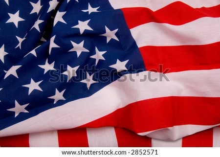Close up of flag of the United States of America with folds and wrinkles