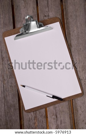 Clip board with pen and blank paper
