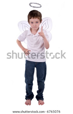 Young boy in an angel costume with wings and a halo isolated over white