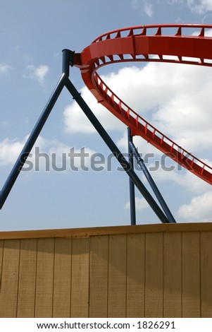 Roller Coaster segment behind wooden fence from Busch Gardens, Tampa Florida