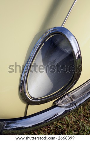 stock photo Detail of vintage British car fender headlight