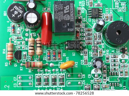 Closeup of a green electronic circuit board
