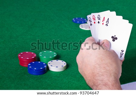 Closeup of cards and chips while playing poker
