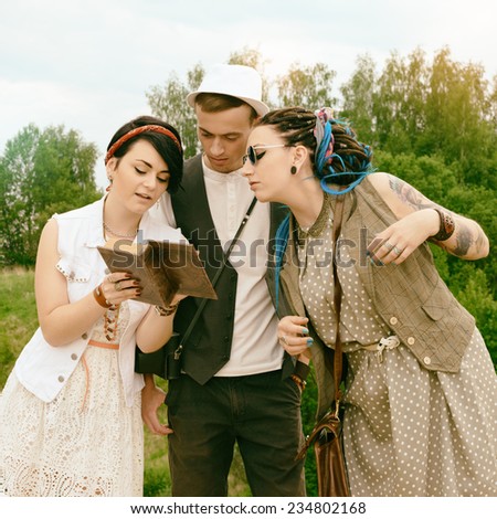 guy and girls hipsters are engaged in self-development by means of the book and literature