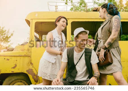young active girls and guy hipsters of have fun outdoors summer