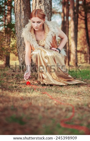 fairy tale about princess with fatal ball of threads in the wood