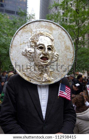 NEW YORK - OCTOBER 4: Protestors dressed as CHANGE in Zuccotti Park during the Occupy Wall Street movement.  October 4, 2011 in New York City, NY.