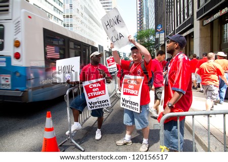 NEW YORK - AUG 12: Verizon Workers, members of the CWA union, strike in front of the headquarters offices in Manhattan on August 12, 2011.