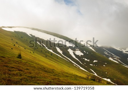 Spring cloudy landscape in the Gemba mountain in the Carpathians